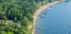 Aerial view of typical lakeshore with docks and boats in Minnesota